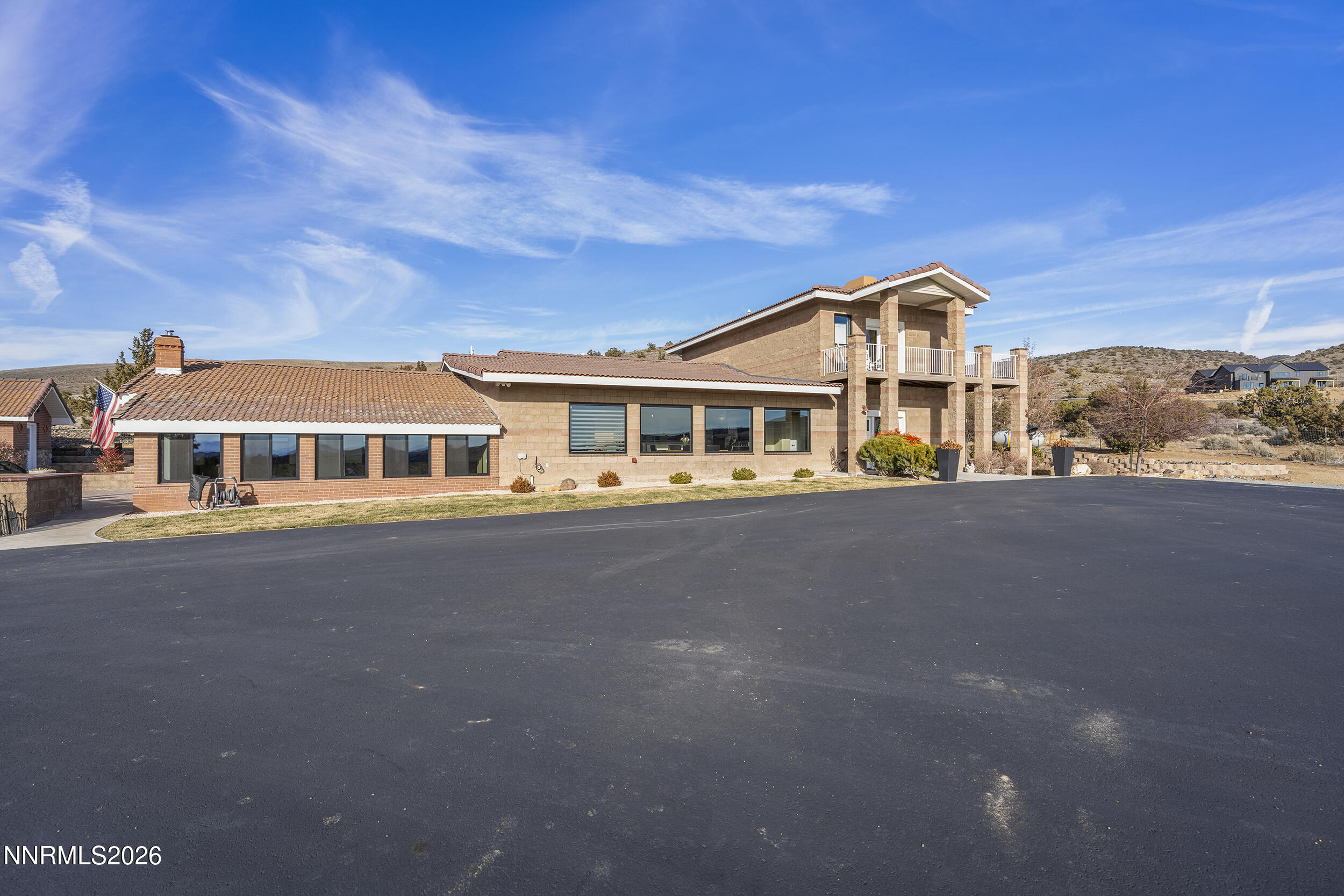 730 Encanto Drive Sparks, NV 89441 - Photo 29 of 87 a front view of a house with a garden