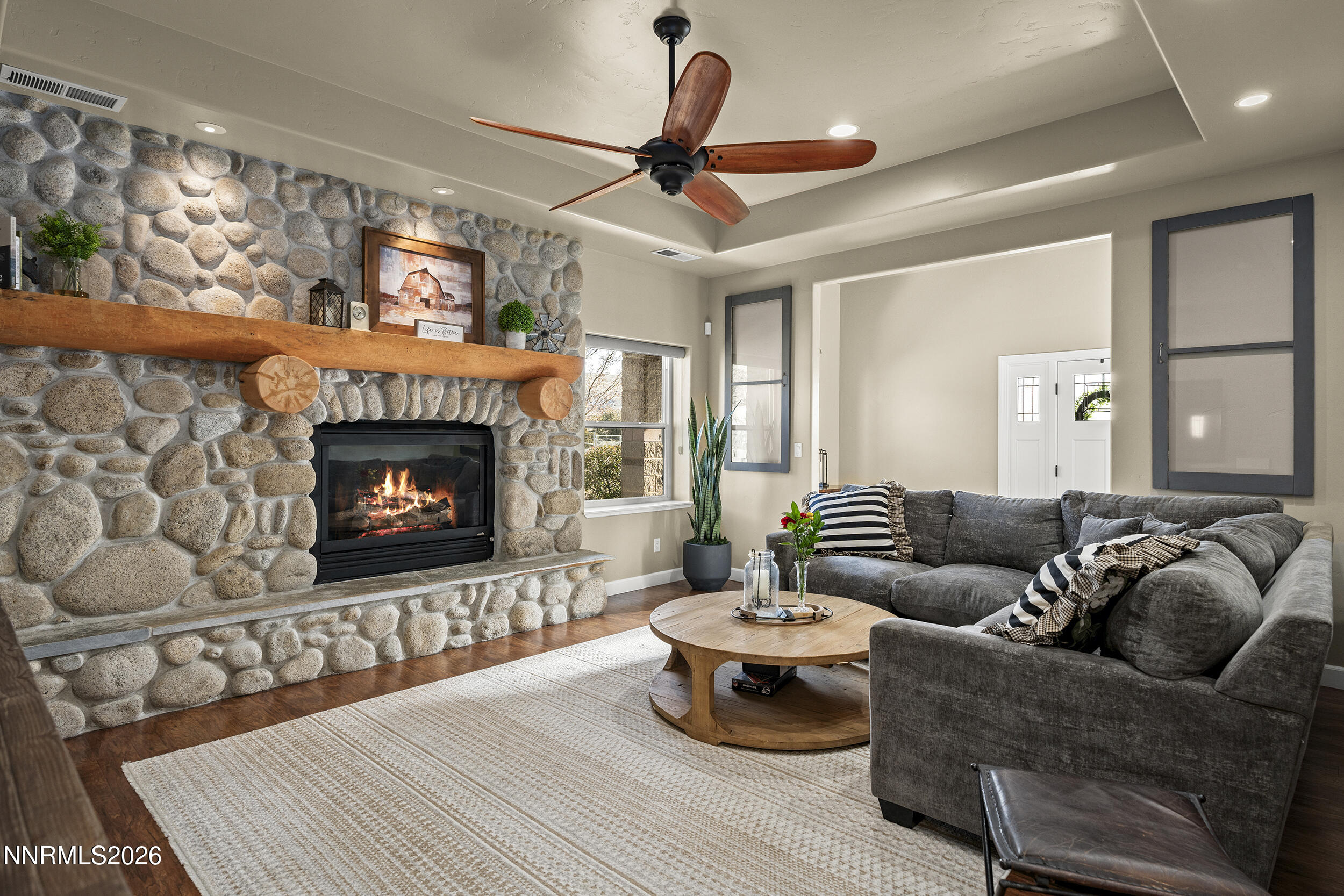 730 Encanto Drive Sparks, NV 89441 - Photo 3 of 87 a living room with furniture and a fireplace