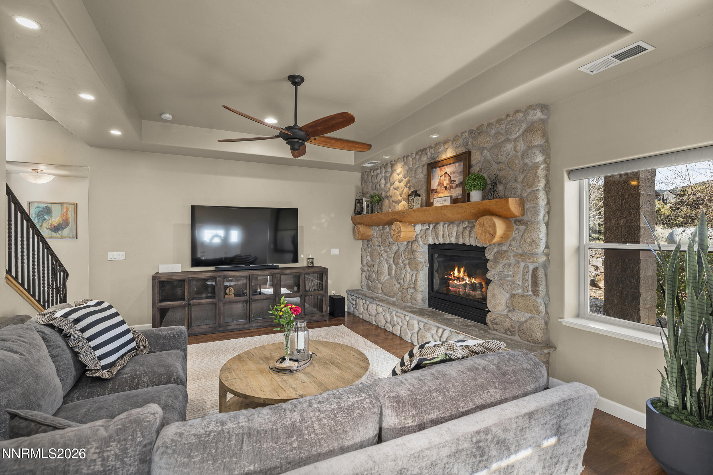 730 Encanto Drive Sparks, NV 89441 - Photo 32 of 87 a living room with furniture and a fireplace