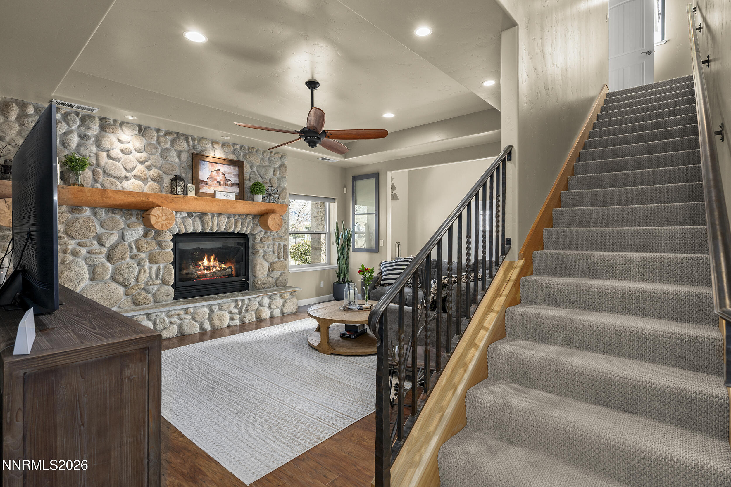 730 Encanto Drive Sparks, NV 89441 - Photo 34 of 87 a living room with furniture and a fireplace