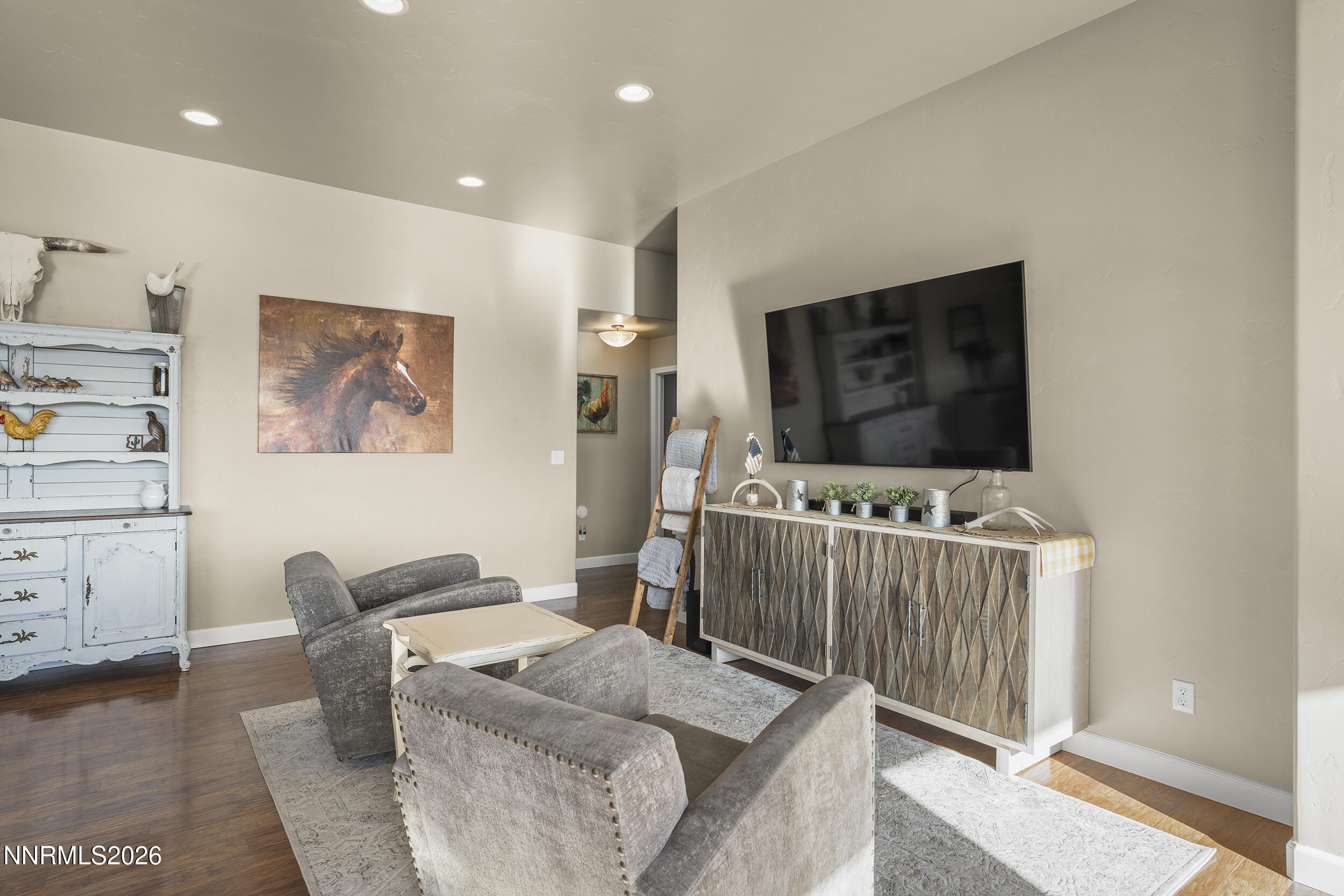 730 Encanto Drive Sparks, NV 89441 - Photo 37 of 87 a living room with furniture and a flat screen tv