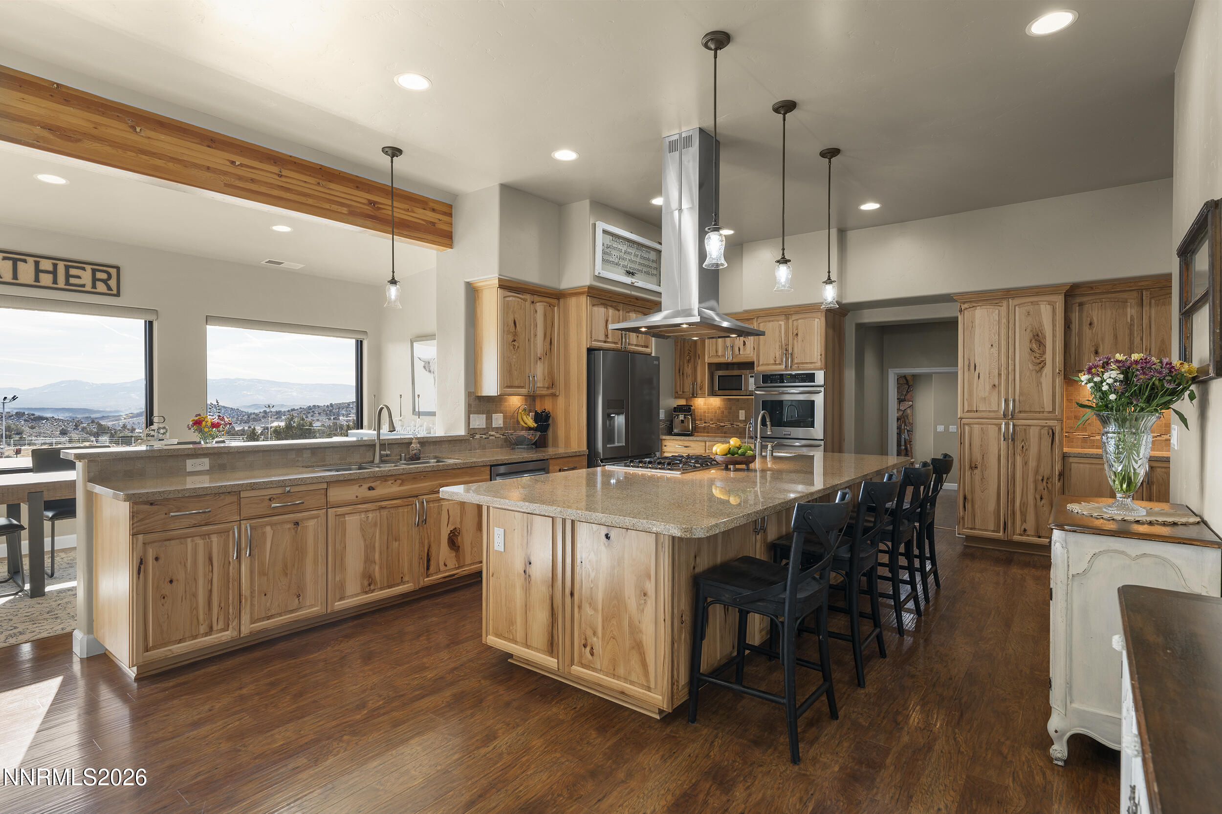730 Encanto Drive Sparks, NV 89441 - Photo 4 of 87 a large kitchen with cabinets a sink a counter space and appliances