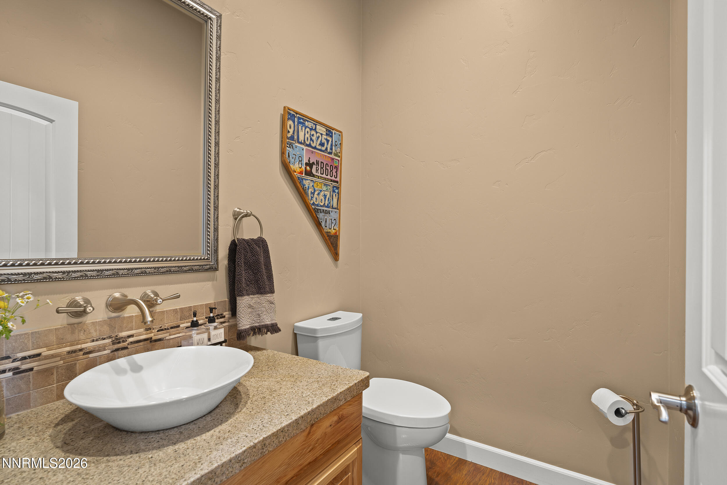 730 Encanto Drive Sparks, NV 89441 - Photo 42 of 87 a bathroom with a sink and a mirror