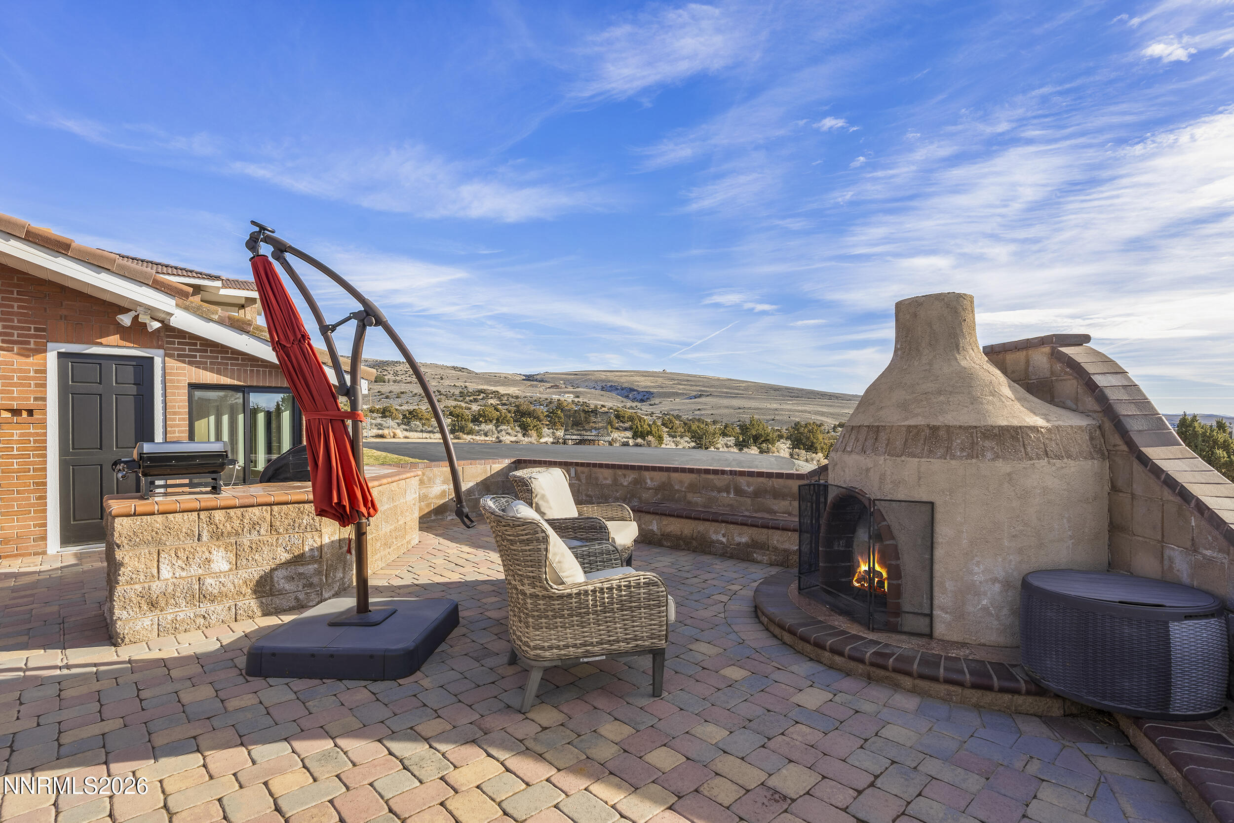 730 Encanto Drive Sparks, NV 89441 - Photo 56 of 87 a roof deck with couches and wooden fence