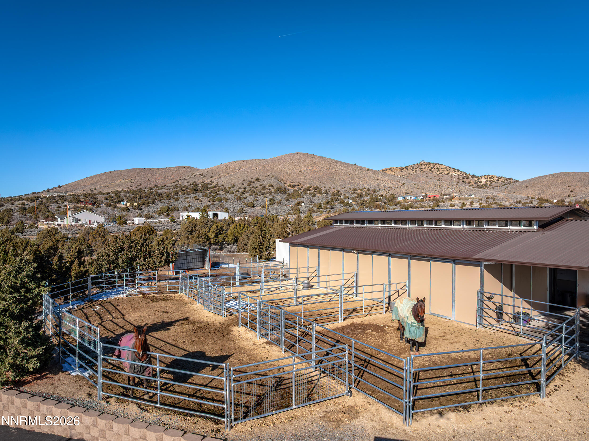 730 Encanto Drive Sparks, NV 89441 - Photo 69 of 87 a view of a patio with couches under an umbrella
