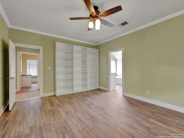 a bathroom with a bathtub and a sink