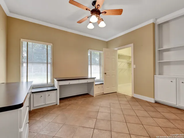 a bathroom with a sink vanity and a mirror