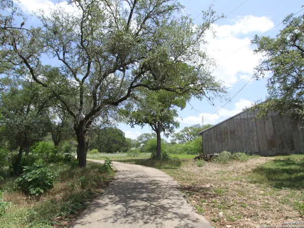 front view of a house with a big yard