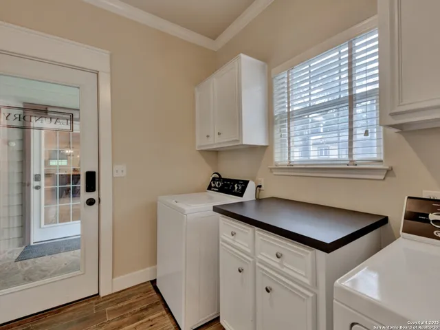 a view of a house with backyard and porch