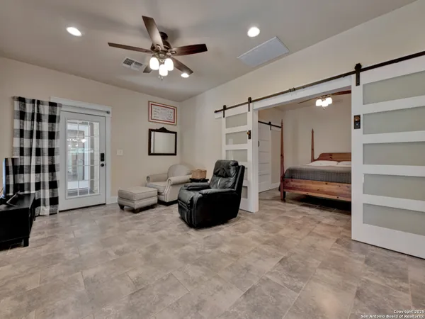 a bathroom with a sink a mirror and a shower