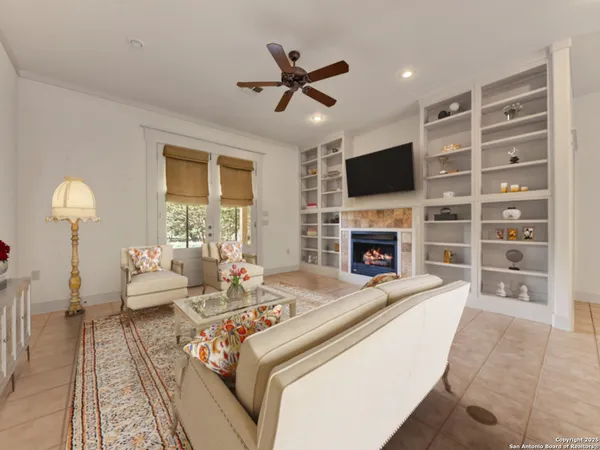 a view of a livingroom with a furniture wooden floor and window