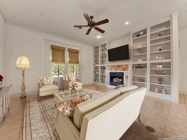 a view of a livingroom with a furniture wooden floor and window