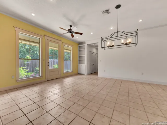 a garden with wooden fence