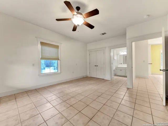 an aerial view of house with yard and outdoor space