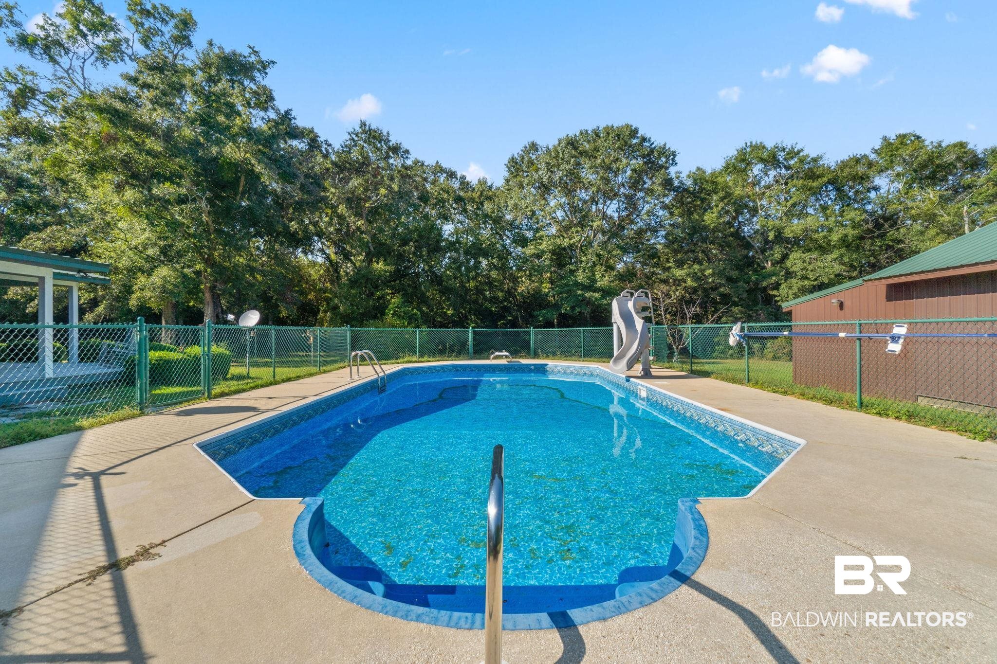 27300 C R Watson Road Robertsdale, AL 36567 - Photo 27 of 35 View of swimming pool with a water slide