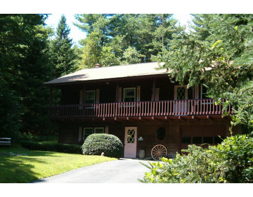 a view of a chair and table in the patio