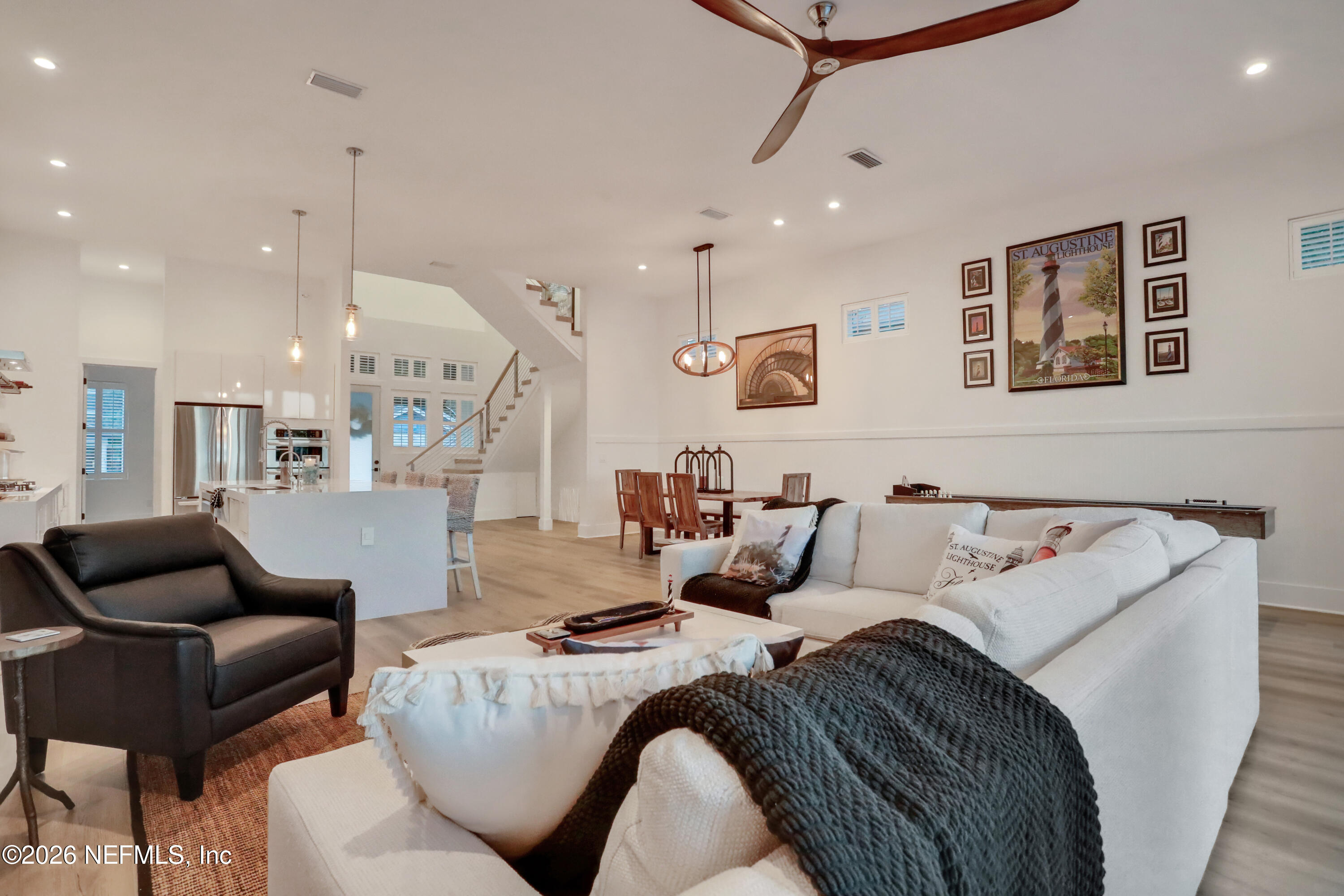 143 Washington Street St. Augustine, FL 32084 - Photo 18 of 76 a living room with furniture and a ceiling fan