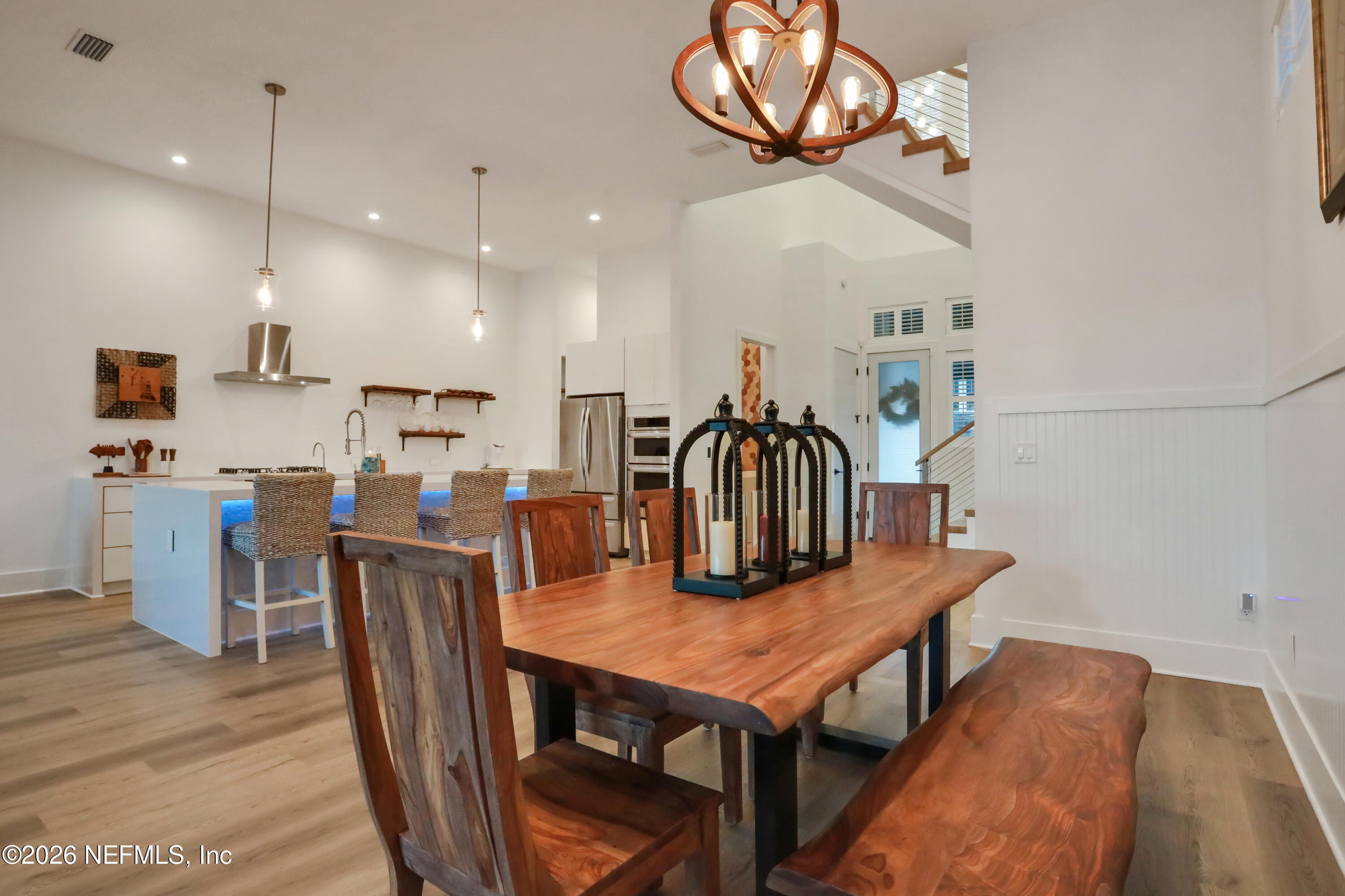143 Washington Street St. Augustine, FL 32084 - Photo 25 of 76 a dining room with furniture and wooden floor