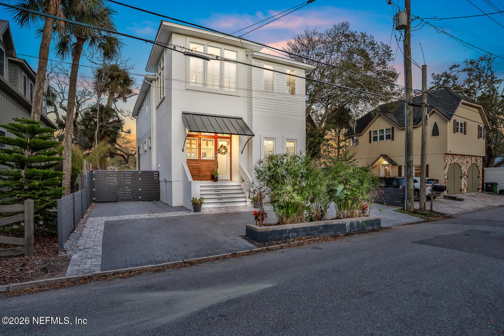 143 Washington Street St. Augustine, FL 32084 - Photo 70 of 76 a front view of a house with a yard