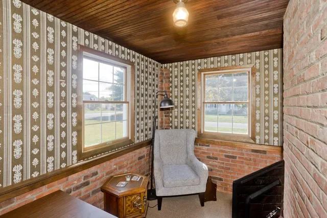 a living room with furniture and windows