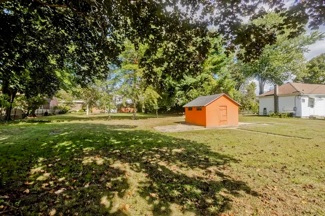 a fire hydrant in the middle of a field