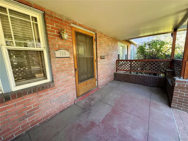 a view of a porch with a bench