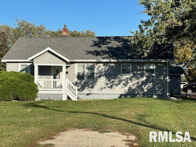 548 Edwards Street Kewanee, IL 61443 - Photo 1 of 18 a front view of a house with garden