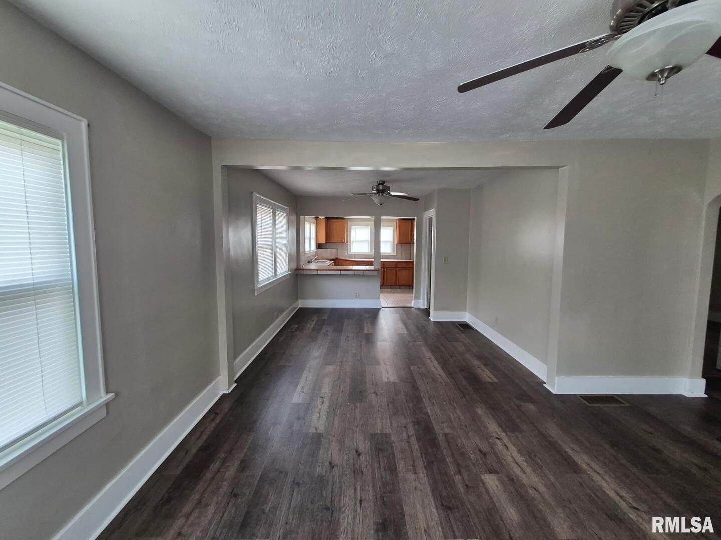 548 Edwards Street Kewanee, IL 61443 - Photo 3 of 18 a view of hallway with wooden floor