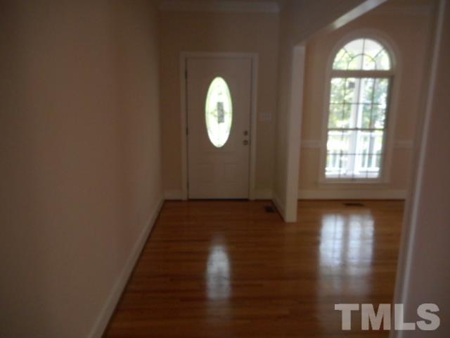 1600 Spennymore Road Raleigh, NC 27603 - Photo 22 of 24 a view of entryway with wooden floor and window
