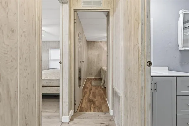 a bathroom with white walls