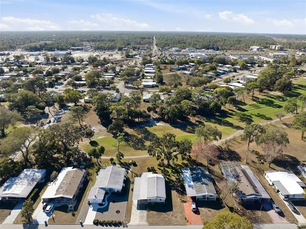 an aerial view of a city with lots of residential buildings