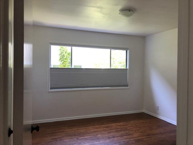 2030 State Street Santa Barbara, CA 93105 - Photo 7 of 7 an empty room with wooden floor and windows