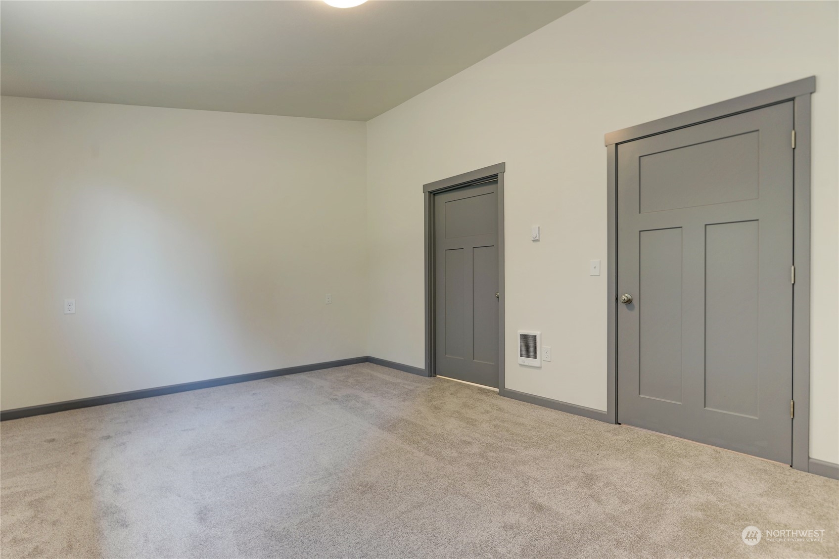 10335 School Land Road Southwest Rochester, WA 98579 - Photo 18 of 35 an empty room with closet area