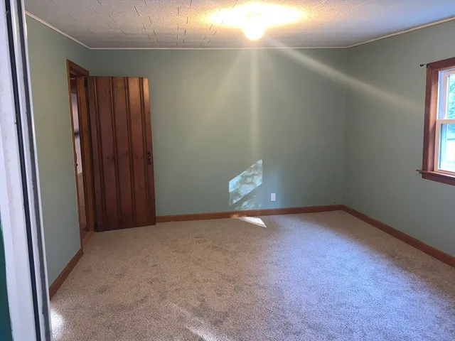 a view of a room with a window