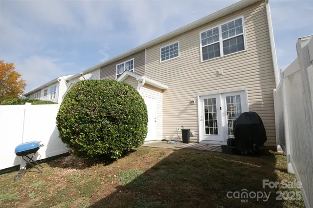 a view of a back yard of the house