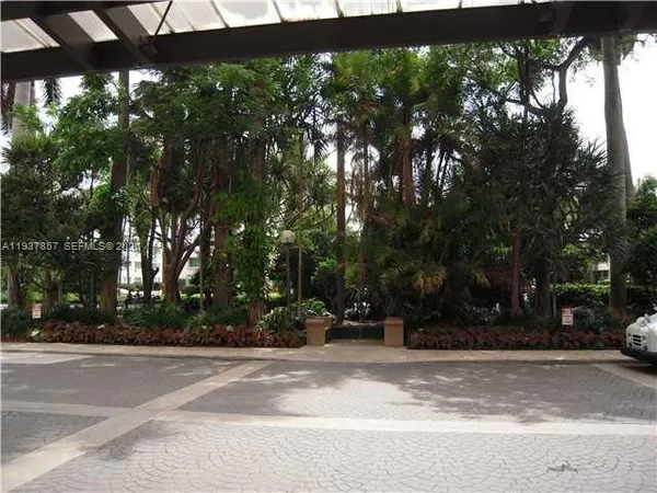 a lobby with furniture and window