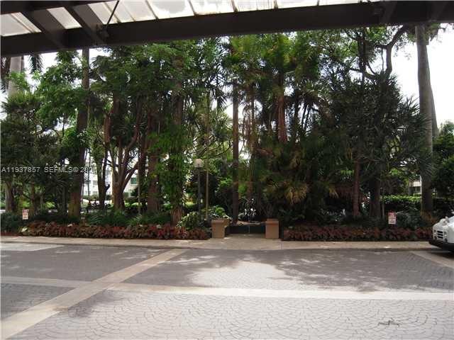 10185 Collins Avenue, Unit PH02 Bal Harbour, FL 33154 - Photo 11 of 37 a view of road with trees