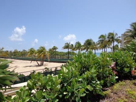 10185 Collins Avenue, Unit PH02 Bal Harbour, FL 33154 - Photo 9 of 37 a view of a lake with a yard