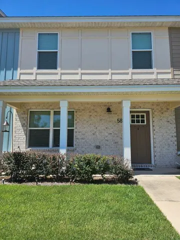 a view of building with yard