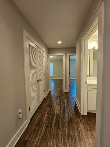 a view of entryway with wooden floor