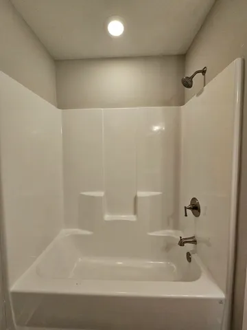 a bathroom with a bathtub