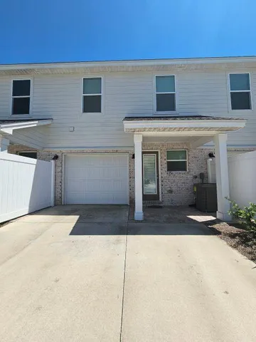 a view of a house with a patio