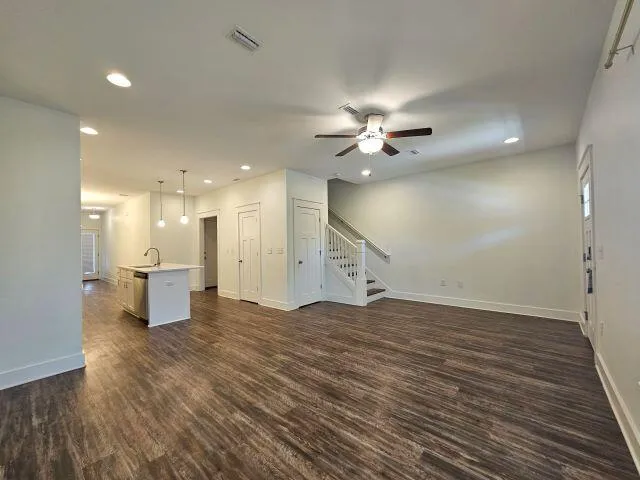 a view of a livingroom with a kitchen