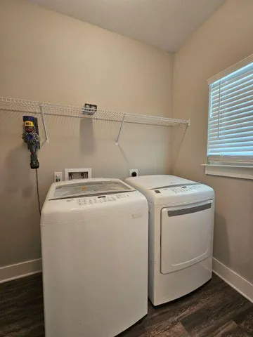 a utility room with dryer and washer