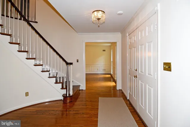 a view of entryway with wooden floor