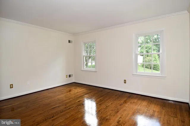 a view of an empty walk in closet