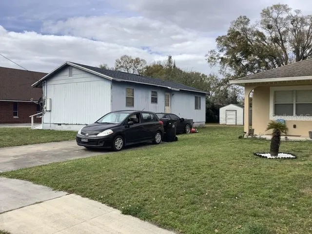 a house view with a garden space