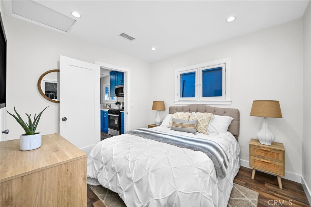 294 Bella Vista Avenue Pasadena, CA 91107 - Photo 23 of 37 a bedroom with a bed and a dresser