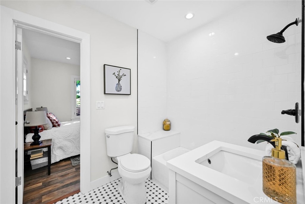 294 Bella Vista Avenue Pasadena, CA 91107 - Photo 25 of 37 a white toilet sitting next to a bathroom sink