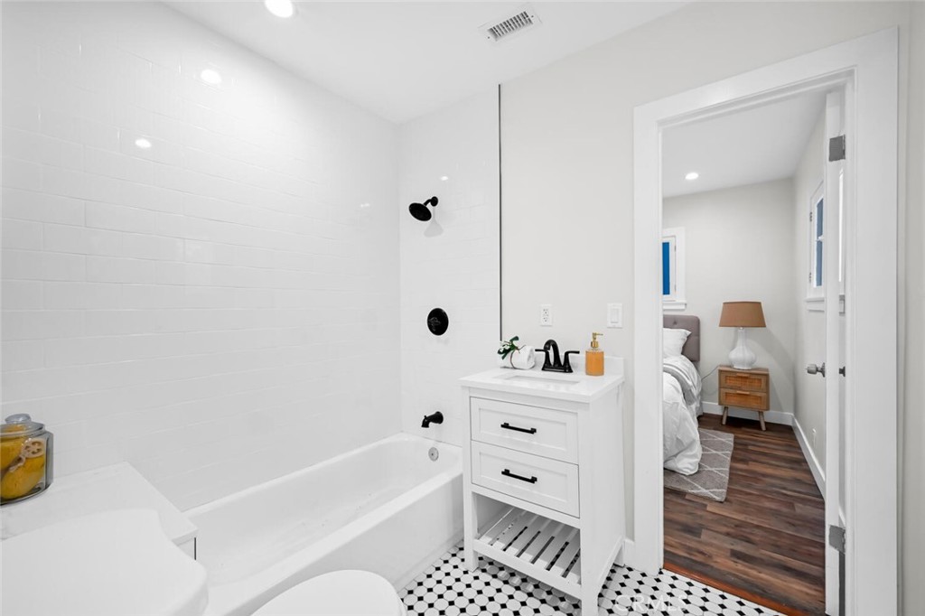 294 Bella Vista Avenue Pasadena, CA 91107 - Photo 26 of 37 a bathroom with a bathtub and a shower